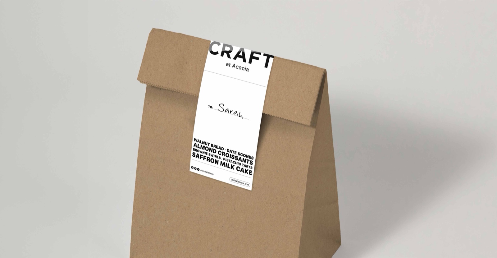 Craft paper bakery bag with a labelled sticker