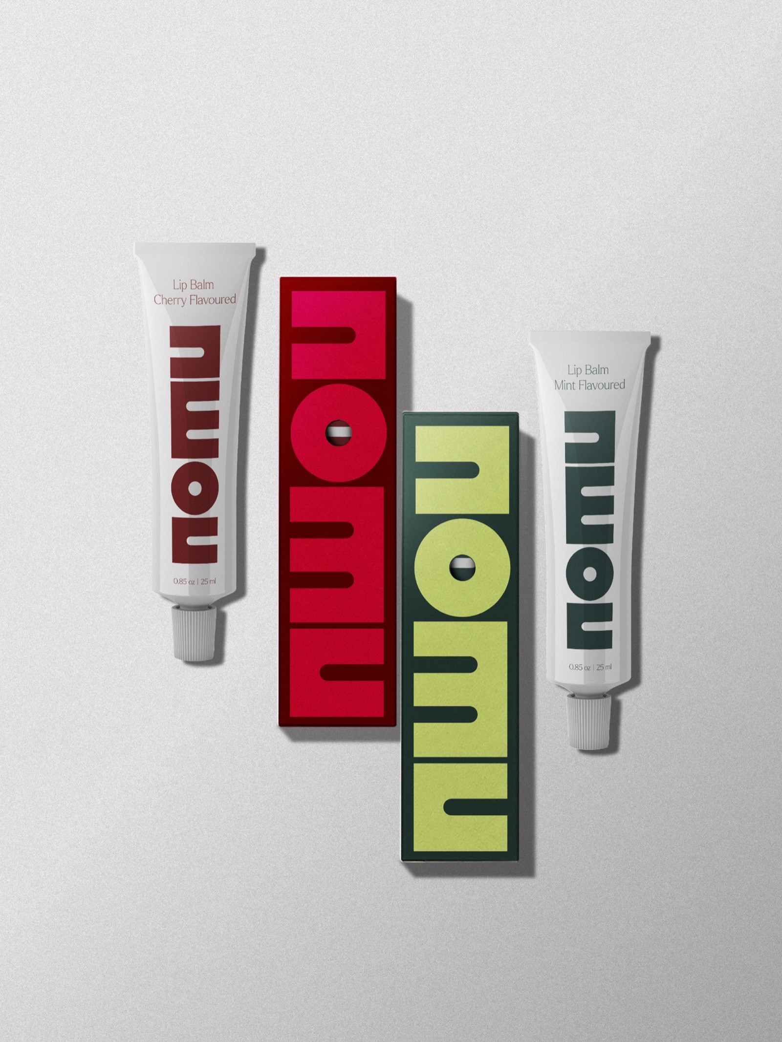 Nomu lip balm tubes and boxes, cherry and mint